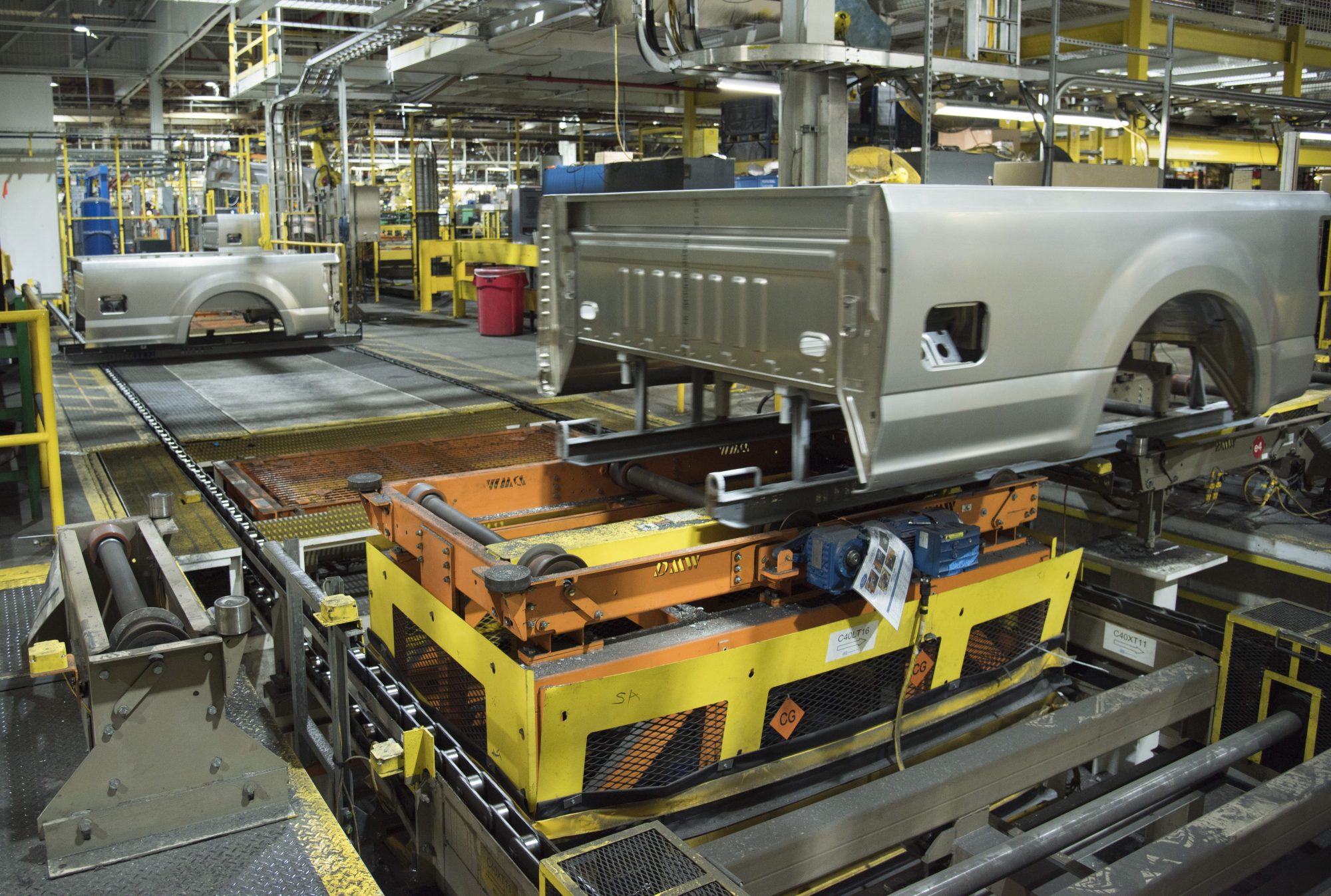 Cars being built with on conveyor line