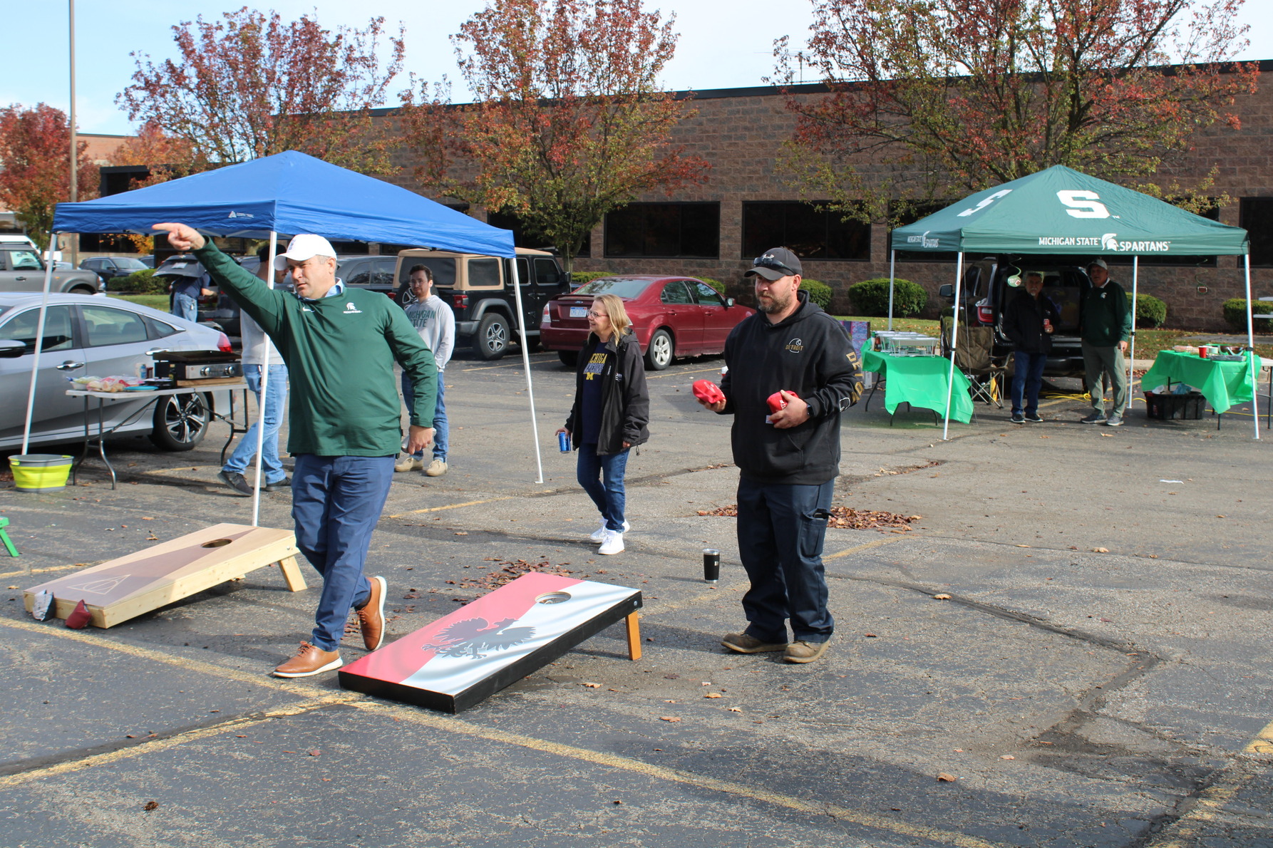 DMWCC Team members playing cornhole